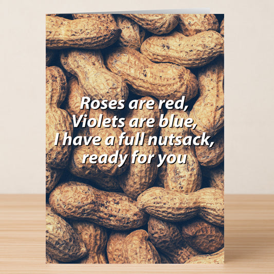 The Nut Sack Twisted Valentine's Card by Twisted Gifts features unshelled peanuts and the cheeky message: "Roses are red, Violets are blue, I have a full nutsack, ready for you." Perfect for fans of playful, unconventional Valentine's greetings.