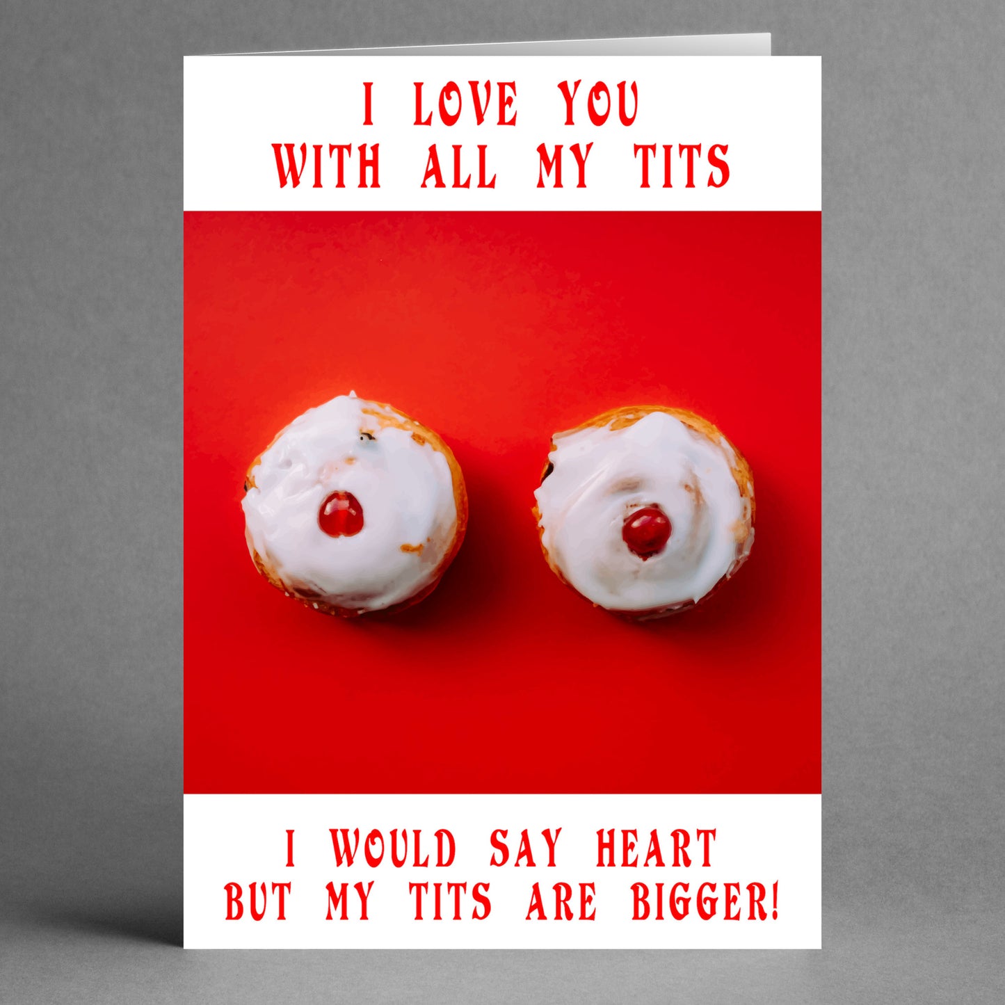 Surprise your special someone with the "All My Heart Funny Valentine's Card" from Twisted Gifts, featuring two pastries adorned with white icing and cherries. The card includes the humorous message: "I love you with all my tits. I would say heart but my tits are bigger!" It's sure to deliver a perfect gift of laughter.