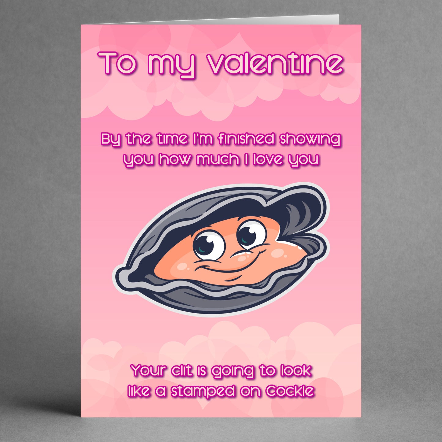 The Cockle Funny Valentine's Card by Twisted Gifts showcases a cartoon clam on a pink background and includes humorous text to help express your love this Valentine's Day.