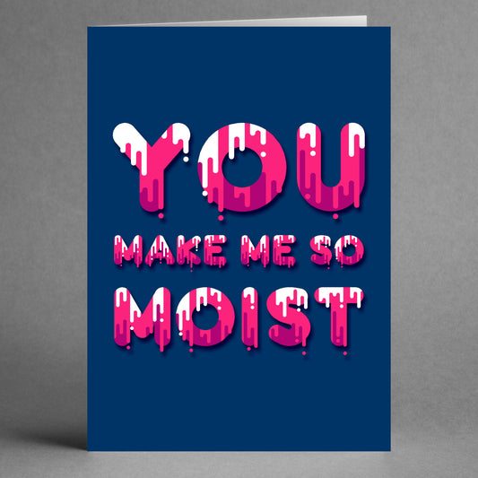 The Moist Rude Valentines Card by Twisted Gifts features a cheeky "YOU MAKE ME SO MOIST" phrase in pink, dripping letters on a dark blue background.