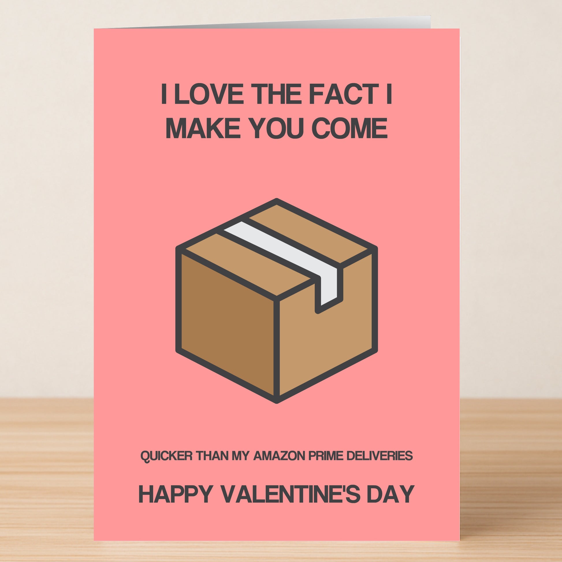 The Prime Funny Valentines Card by Twisted Gifts features a witty pink design with a cardboard box and the text: "I love the fact I make you come quicker than my Amazon Prime deliveries." Ideal for adding humor this Valentine's Day!.