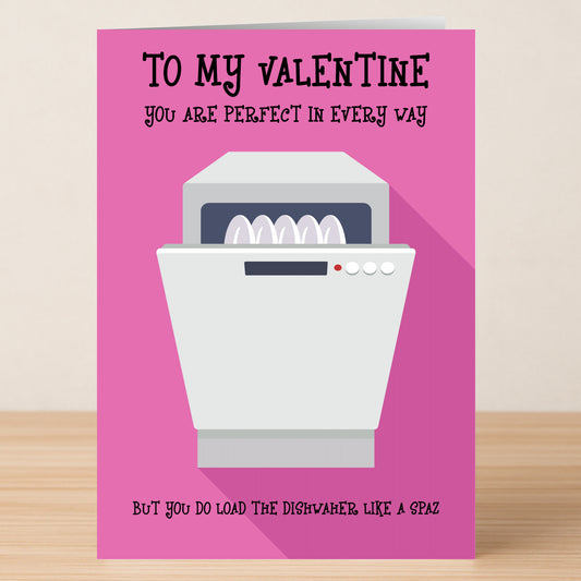 Twisted Gifts’ Dishwasher Spaz Insulting Valentine’s Card is a unique pink card featuring a dishwasher illustration and the cheeky message: "To my Valentine, you are perfect in every way, but you do load the dishwasher like a spaz.