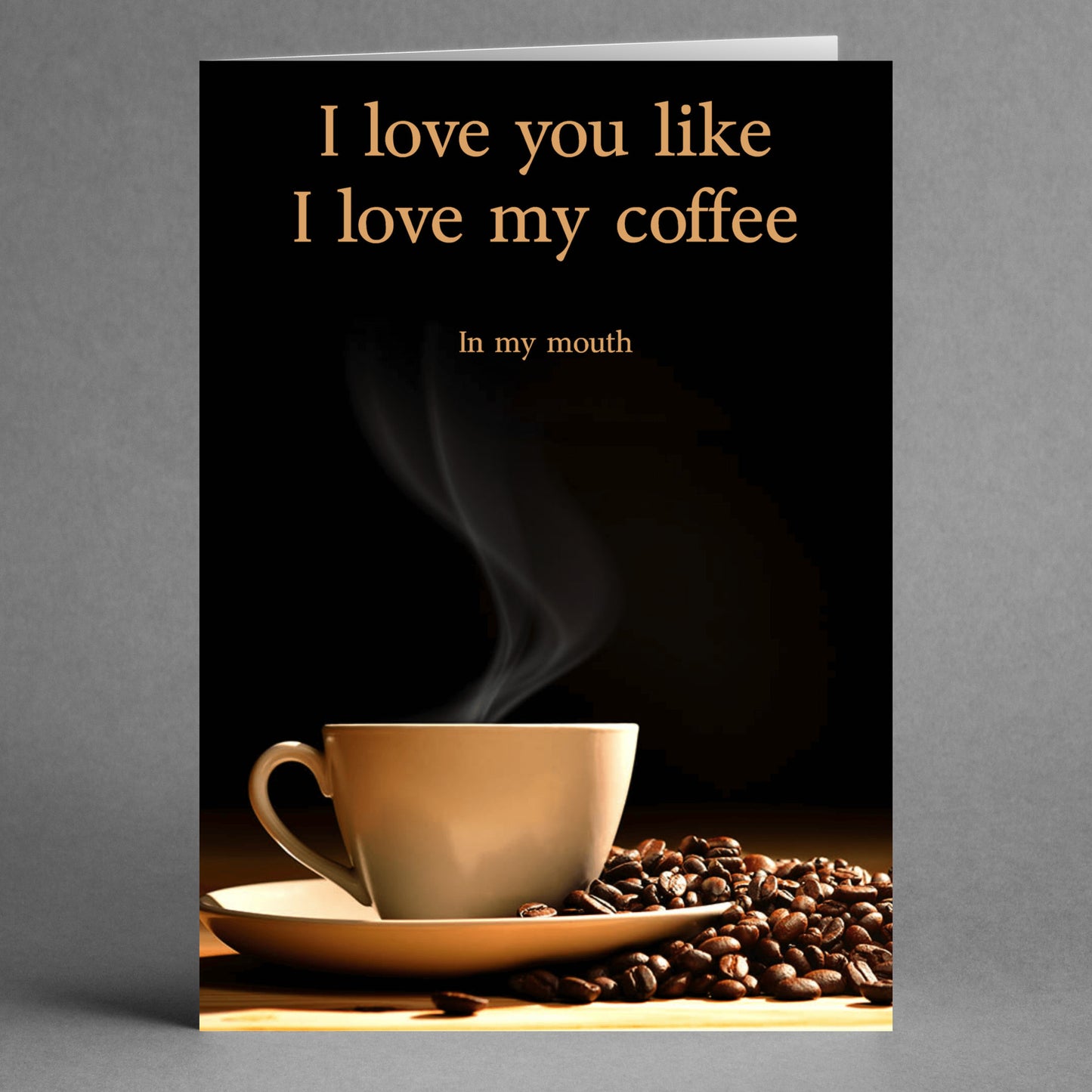 A steaming coffee cup surrounded by coffee beans adorns the Love My Coffee Rude Greeting Card by Twisted Gifts, featuring the witty message: "I love you like I love my coffee - in my mouth." It's an ideal gift for the humor-loving coffee enthusiast.