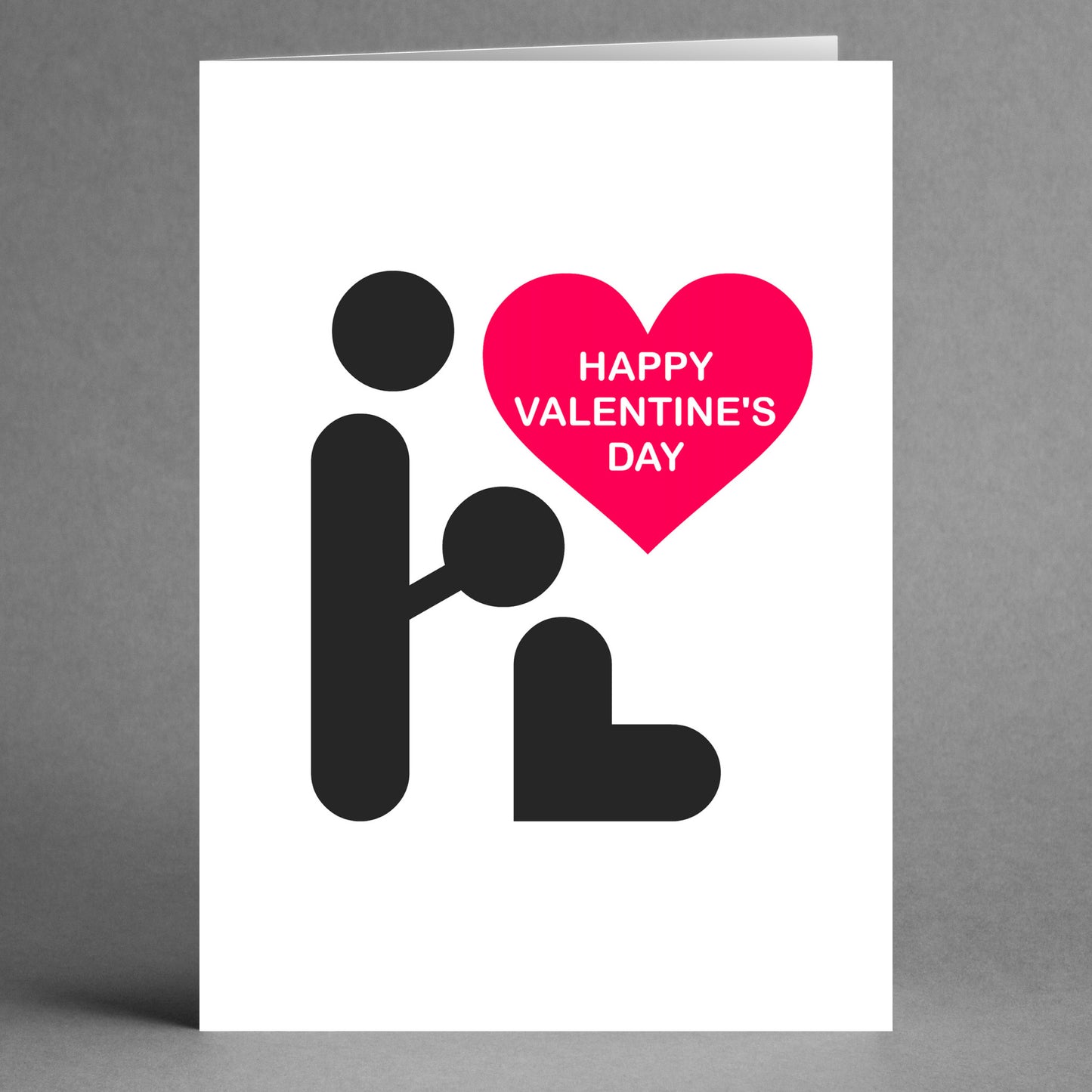 A cheeky design by Twisted Gifts, the "Simple BJ Rude Valentine's Card" showcases a simple black stick figure graphic and a red heart with the text "Happy Valentine's Day," offering a unique and playful twist on traditional Valentine's cards.