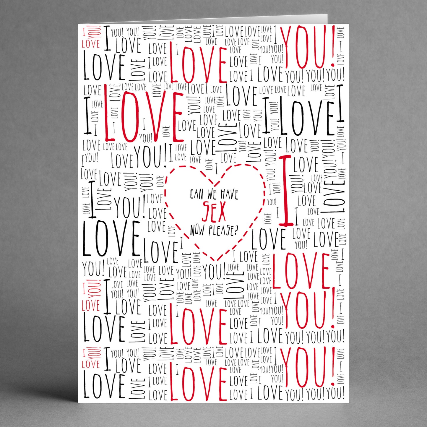 The Loads Of Love Rude Valentine's Card by Twisted Gifts humorously features scattered "LOVE YOU" text in red and black, with a cheeky central heart outline that reads, "Can we have sex now, please?" adding a touch of sarcasm to your romantic gesture.