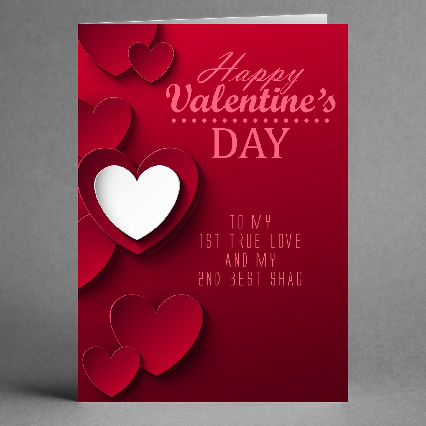 Introducing the "2nd Best Funny Valentine's Card" by Twisted Gifts—a red card adorned with heart decorations. The whimsical message reads, "Happy Valentine's Day to my 1st true love and my 2nd best shag," making it perfect for sharing a valentine laugh.