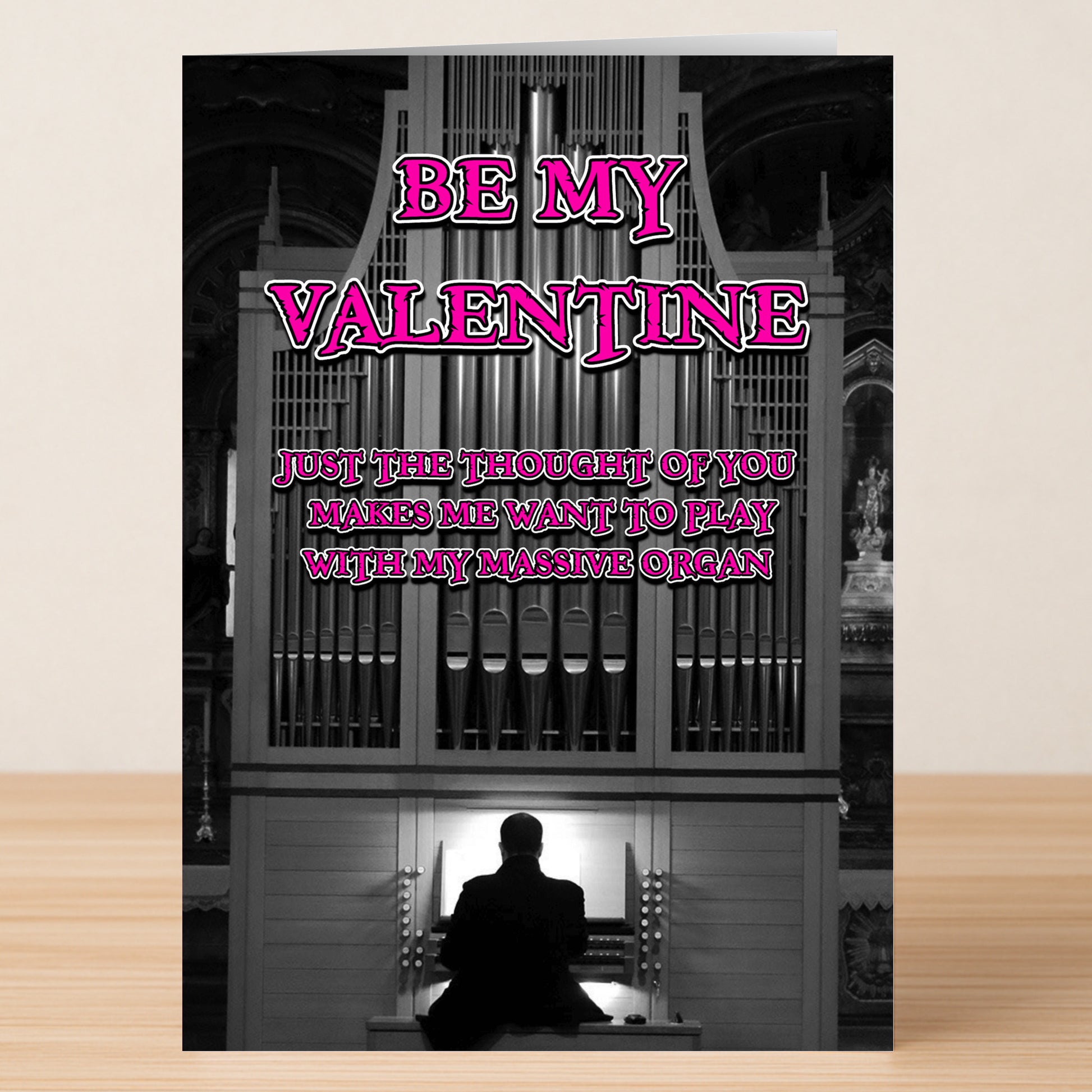 The Organ Rude Valentine's Card by Twisted Gifts features a playful “Be My Valentine” message and a cheeky organ pun, paired with an illustration of someone at a grand pipe organ—perfect for Valentine’s Day.
