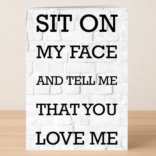 The Sit On My Face Rude Valentine's Card by Twisted Gifts features bold text on a white brick background, making it a perfect cheeky Valentine’s card for someone with a sense of humor.