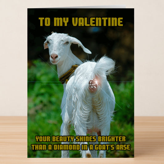 The Goats Arse Rude Valentine's Card by Twisted Gifts features a goat’s rear with the message: "Your beauty shines brighter than a diamond in a goat's arse." A cheeky and humorous choice for Valentine’s Day!.