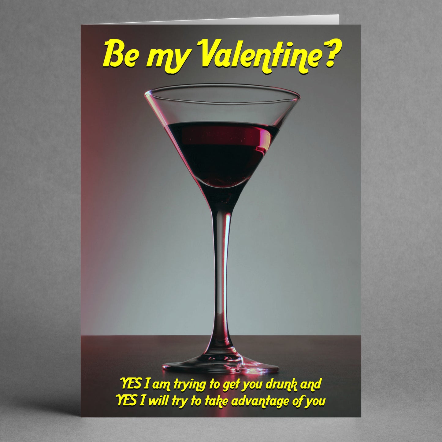 The Get You Drunk Her Rude Valentine's Card by Twisted Gifts features a martini glass with a dark drink, humorously asking, "Be my Valentine? YES I am trying to get you drunk and YES I will try to take advantage of you." It's perfect for a fun-loving partner who enjoys a cheeky Valentine's card.