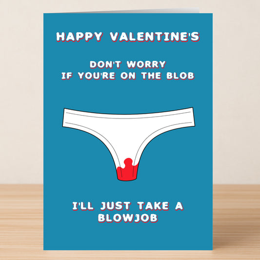 The Blob Rude Valentine's Card by Twisted Gifts features blue artwork with white underwear, a red stain, and the cheeky message: "Happy Valentine's. Don't worry if you're on the blob, I'll just take a blowjob." A playful card for cheeky humor lovers.