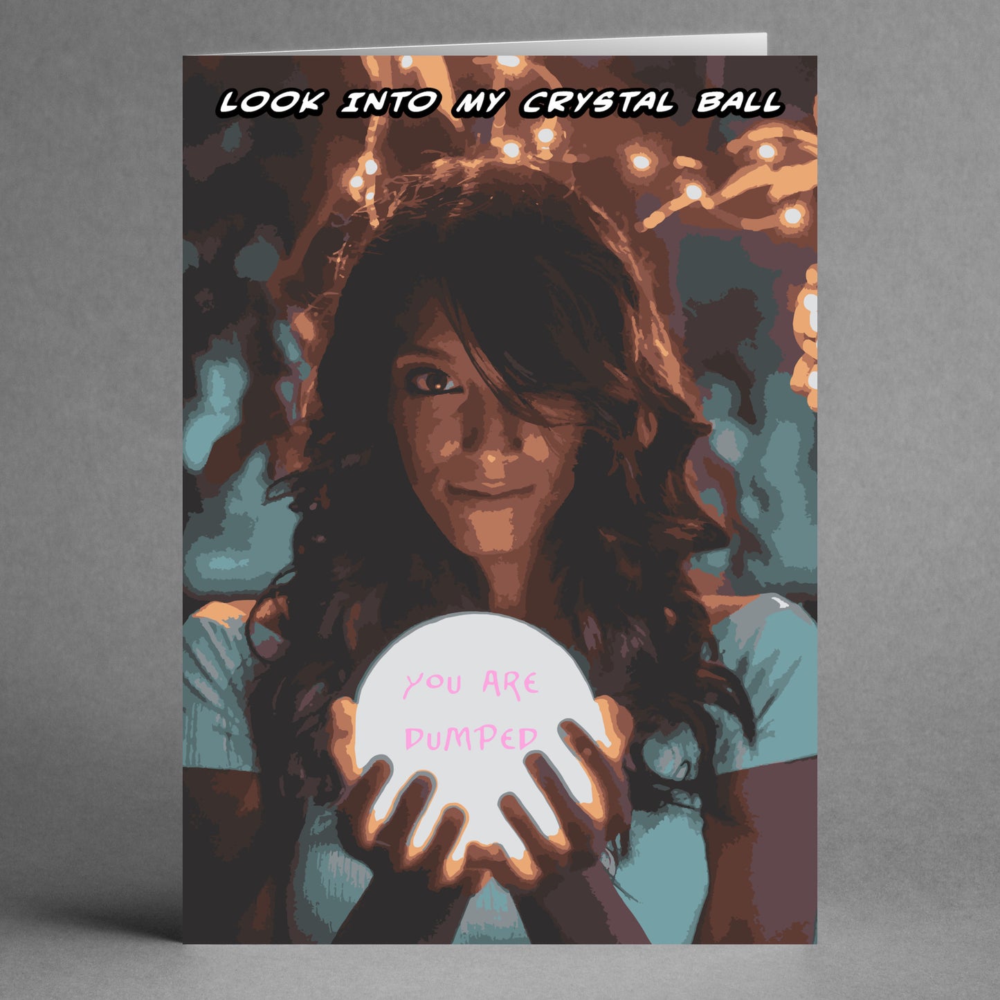 Introducing the "Crystal Ball Funny You're Dumped Card" by Twisted Gifts. This cheeky breakup card features a woman holding an illuminated crystal ball with the words "YOU ARE DUMPED." The top text playfully invites you to "LOOK INTO MY CRYSTAL BALL," set against a mysterious backdrop of lights and shadows. Perfect for delivering your message with humor.