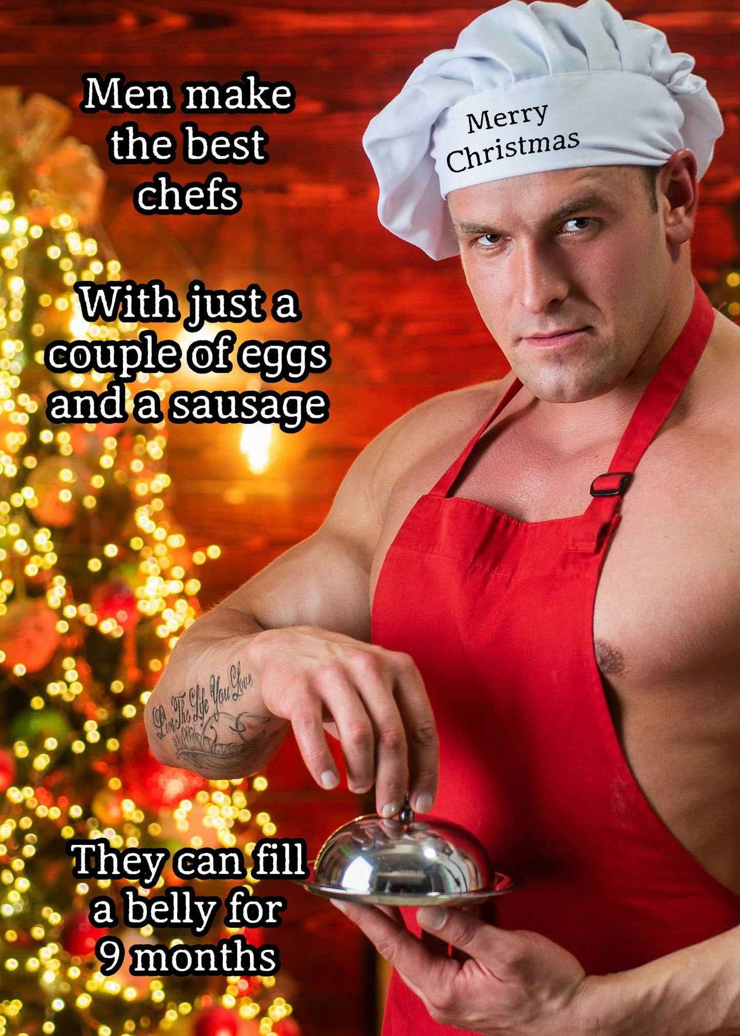 A man in a red apron and Santa hat holds a silver tray. Text reads: "Men make the best chefs. With just a couple of eggs and a sausage, they can fill a belly for 9 months." This Best Chef Funny Christmas Card from Twisted Gifts is perfect holiday humor that's sure to make it the laugh of the season!