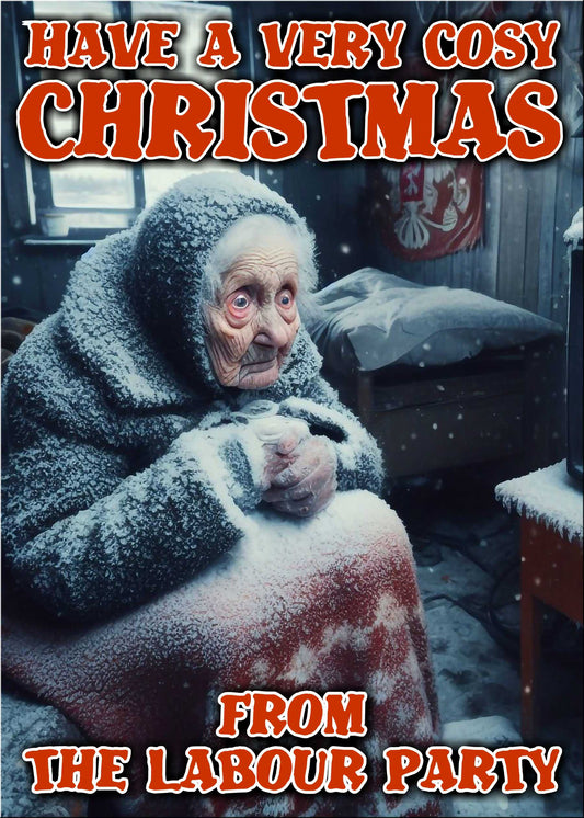 An elderly woman wrapped in multiple layers of clothing and blankets sits indoors, looking cold. The image contains the text: "Have a very cosy Christmas from the Labour Party." Enjoy some wicked holiday cheer with Twisted Gifts' Cosy Funny Christmas Card!