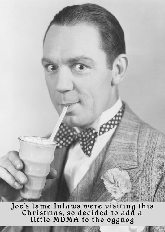 Monochrome image of a man in vintage attire drinking from a cup with a straw. Caption reads: "Joe's lame in-laws were visiting this Christmas, so he decided to add a little MDMA to the eggnog. Inlaws Funny Christmas Card by Twisted Gifts for those with a sense of humor.