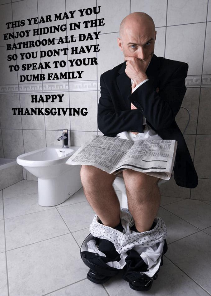 A funny man sitting on a toilet, featured in a Twisted Gifts Hiding Insulting Thanksgiving Card.