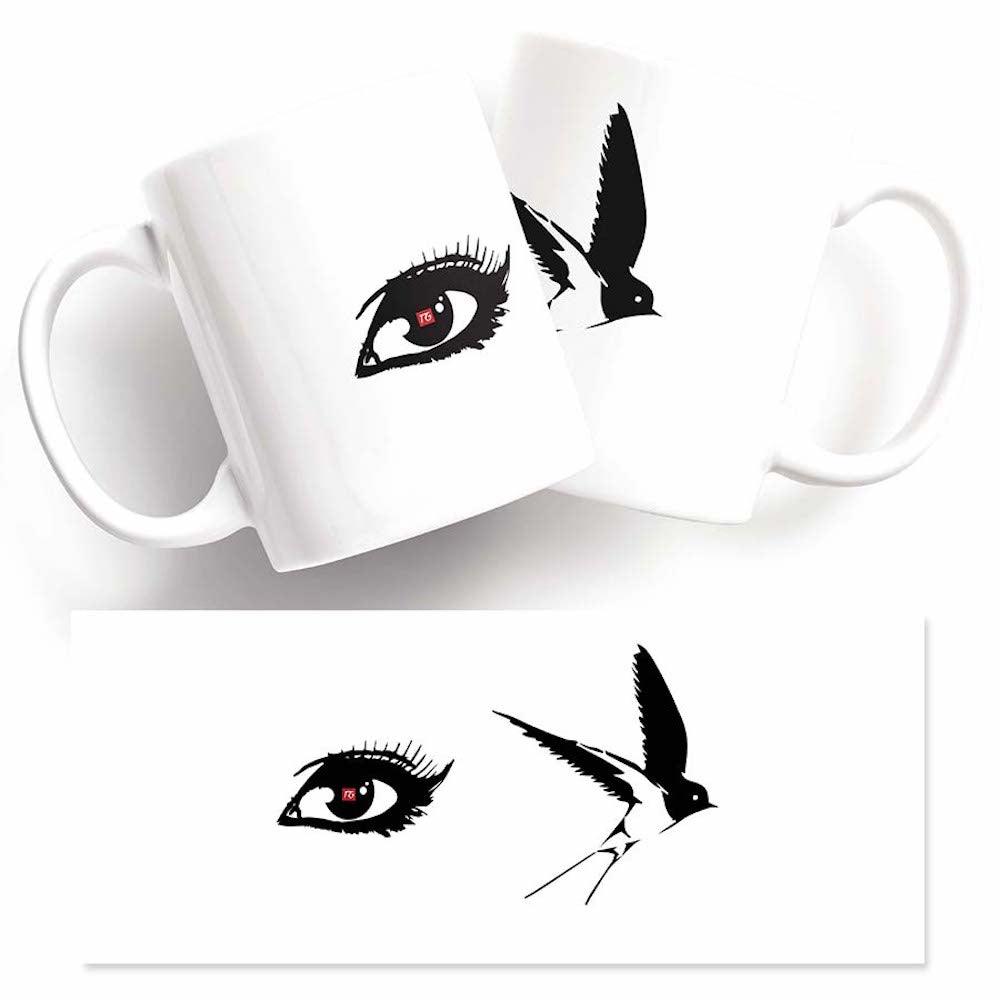 A Funny I Swallow Mug with a Twisted Gifts and a woman's eye.