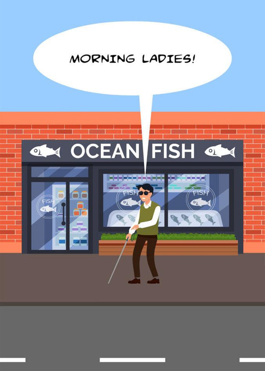 A man holding a Morning Ladies Funny Birthday Card from Twisted Gifts, standing in front of an ocean fish store.