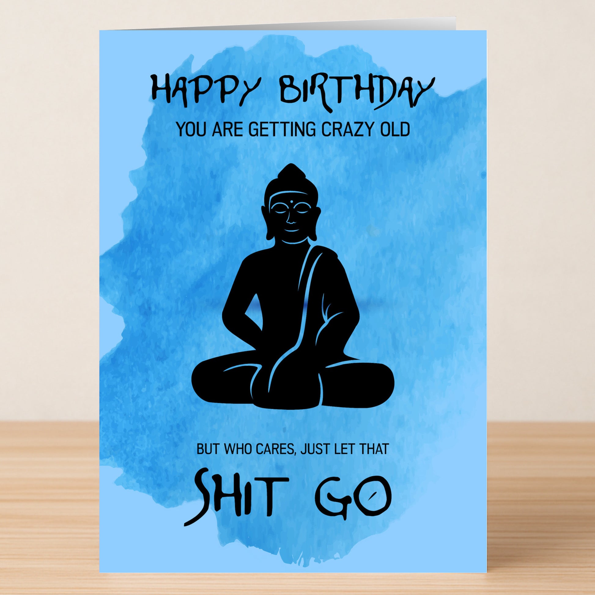 The "Who Cares – Funny Birthday Card" by Twisted Gifts features a blue Buddha design and the message: "Happy Birthday. You are getting crazy old. But who cares, just let that shit go.