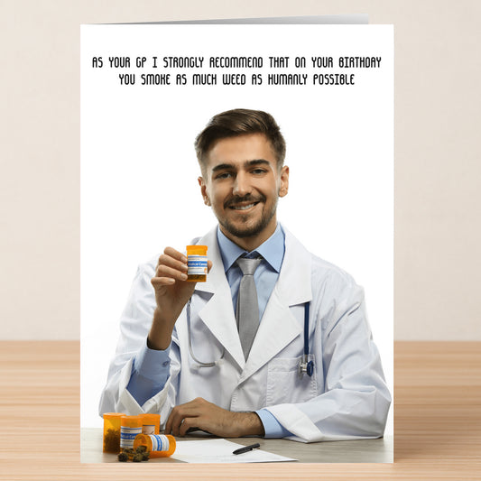 A smiling male doctor in a white coat holds a prescription bottle, with text above: "As your GP I strongly recommend that on your birthday you smoke as much weed as humanly possible." Humanly – Funny Birthday Card by Twisted Gifts. Perfect for friends who love a laugh!.