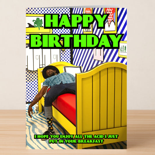 Breakfast – Funny Birthday Card by Twisted Gifts features a person sprawled on a colorful bed with bold "HAPPY BIRTHDAY" text and a cheeky acid-in-breakfast joke for that perfect rude birthday humor.