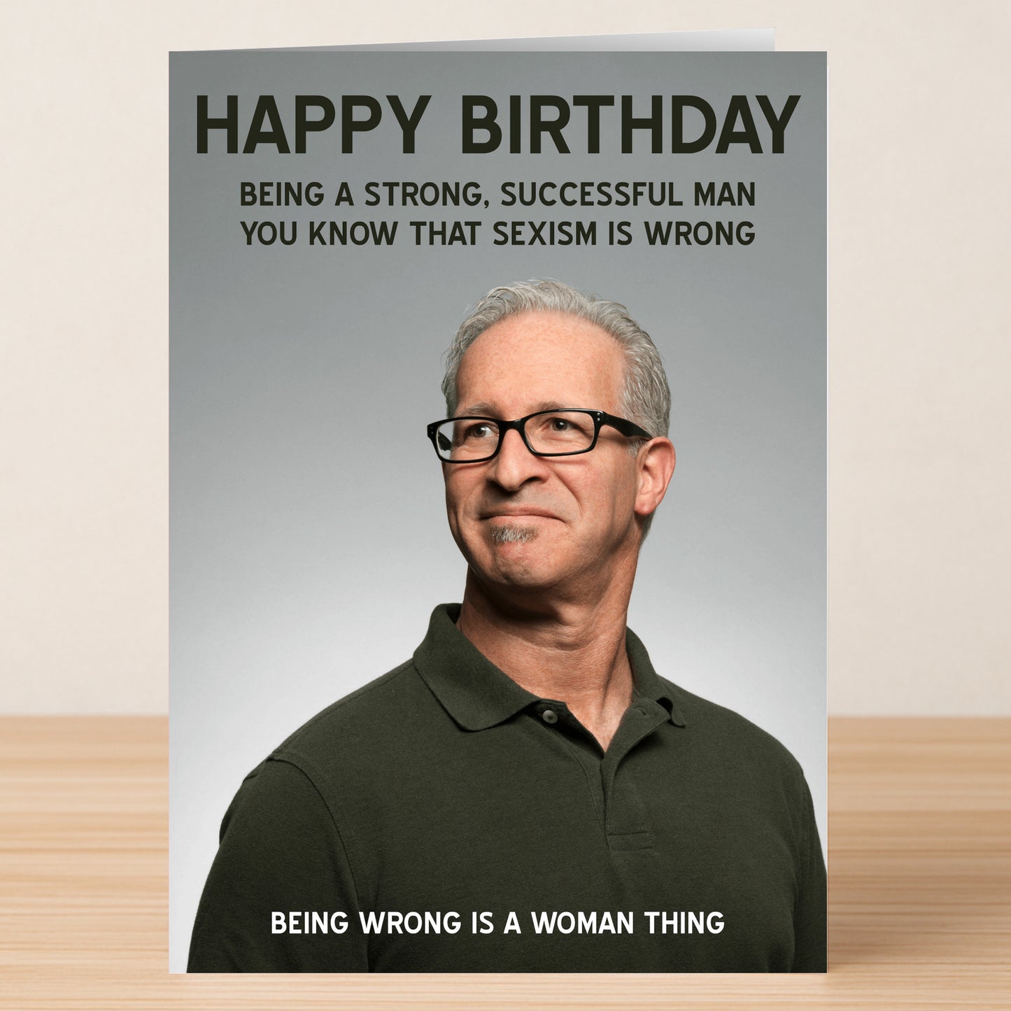 Sexism (Him) – Funny Birthday Card by Twisted Gifts features a man in glasses and a dark green polo shirt. This card uses sharp humor to tackle sexism, ending with an edgy, offensive punchline to shock and amuse on birthdays.
