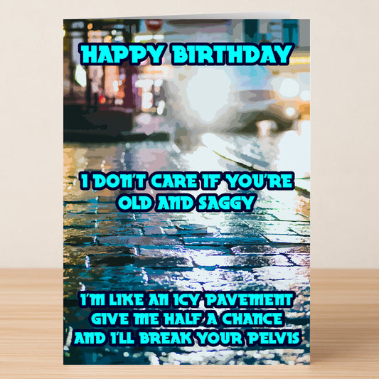 Pelvis – Rude Birthday Card by Twisted Gifts: "Happy Birthday. I don't care if you're old and saggy. I'm like an icy pavement—give me half a chance and I'll break your pelvis." Features wet cobblestones background.