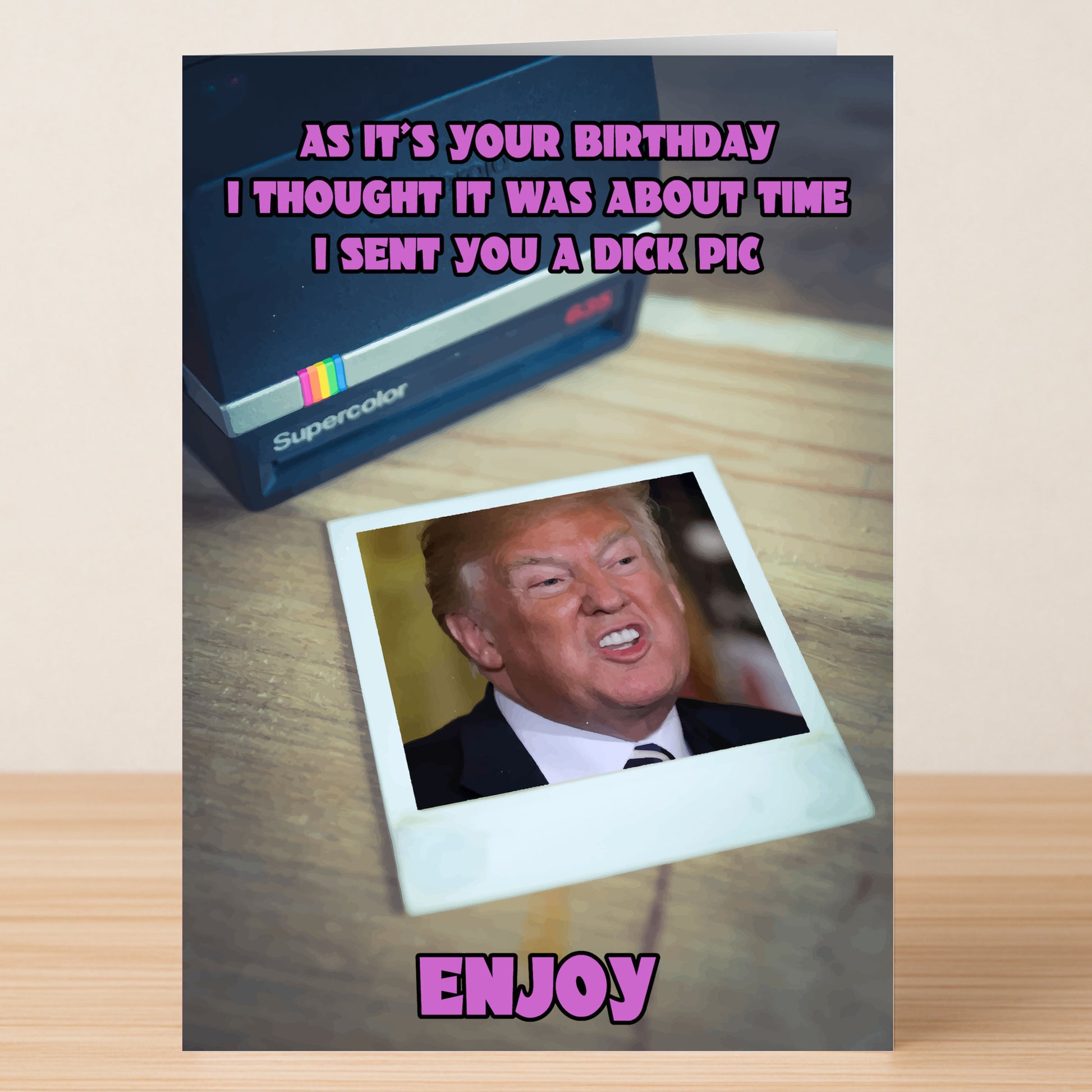 The Dick Pic Funny Birthday Card by Twisted Gifts features a Polaroid camera, a photo of Donald Trump making a face, and bold purple humorous birthday text.