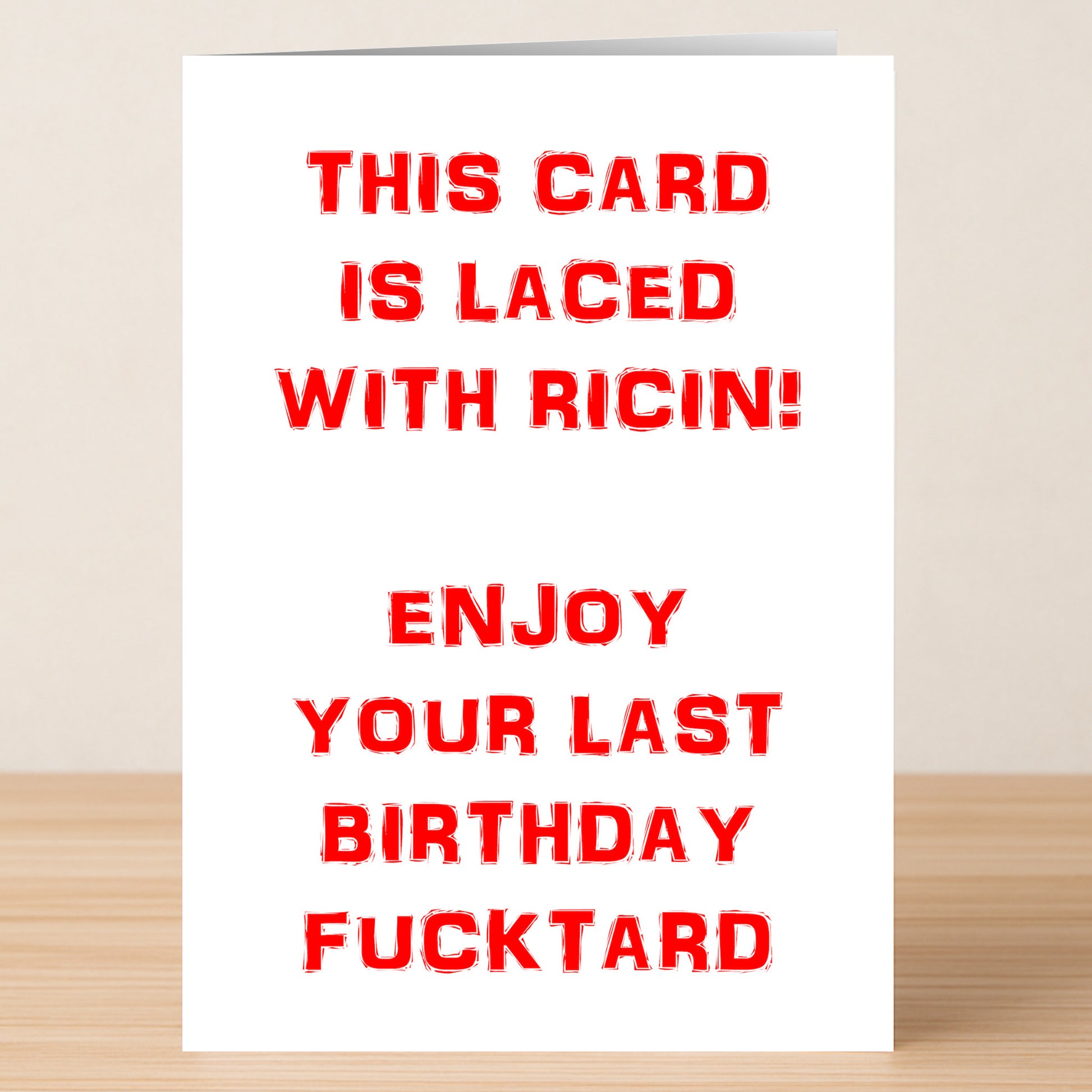 The "Ricin – Insulting Birthday Card" by Twisted Gifts features boldly rude red text and a hilarious message—ideal for anyone who appreciates an offensive birthday card with attitude.