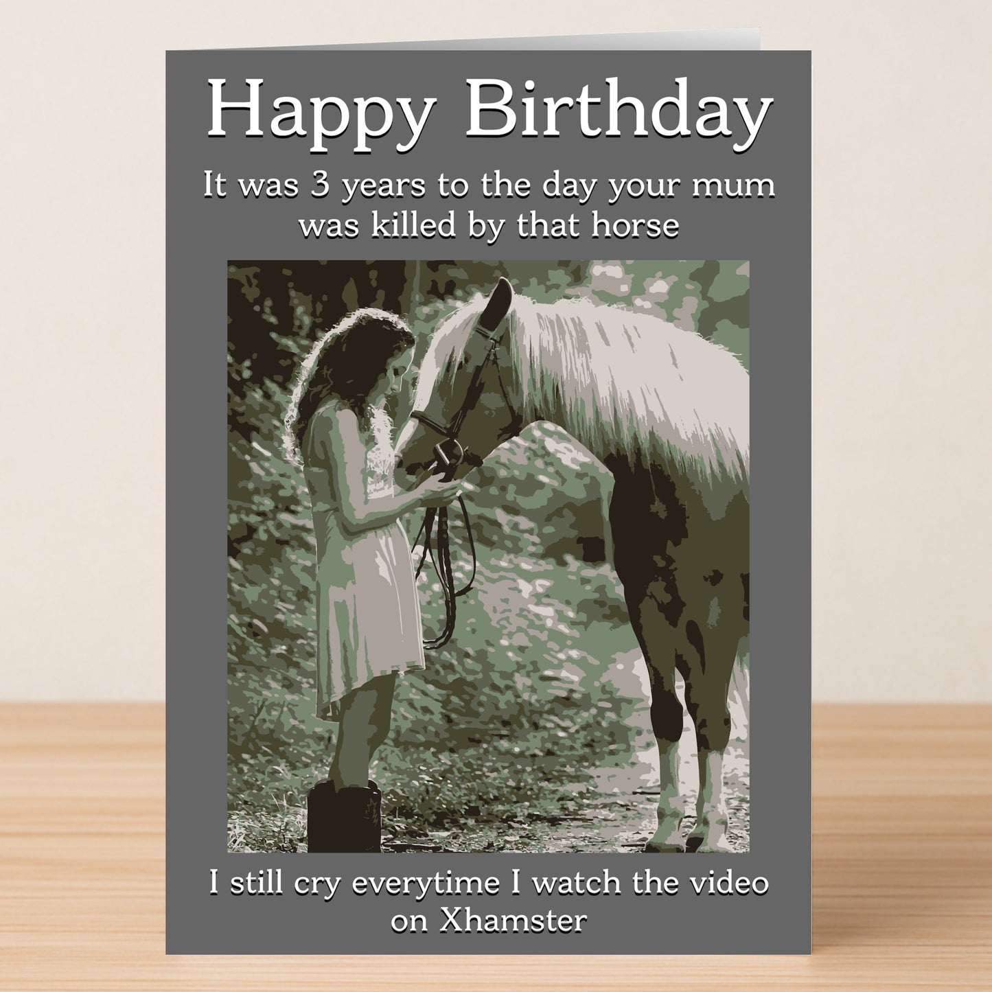 A young girl stands by a white horse in the woods on the front of Twisted Gifts' "Horse – Rude Birthday Card," serving up sarcasm and dark humor for a memorable birthday.