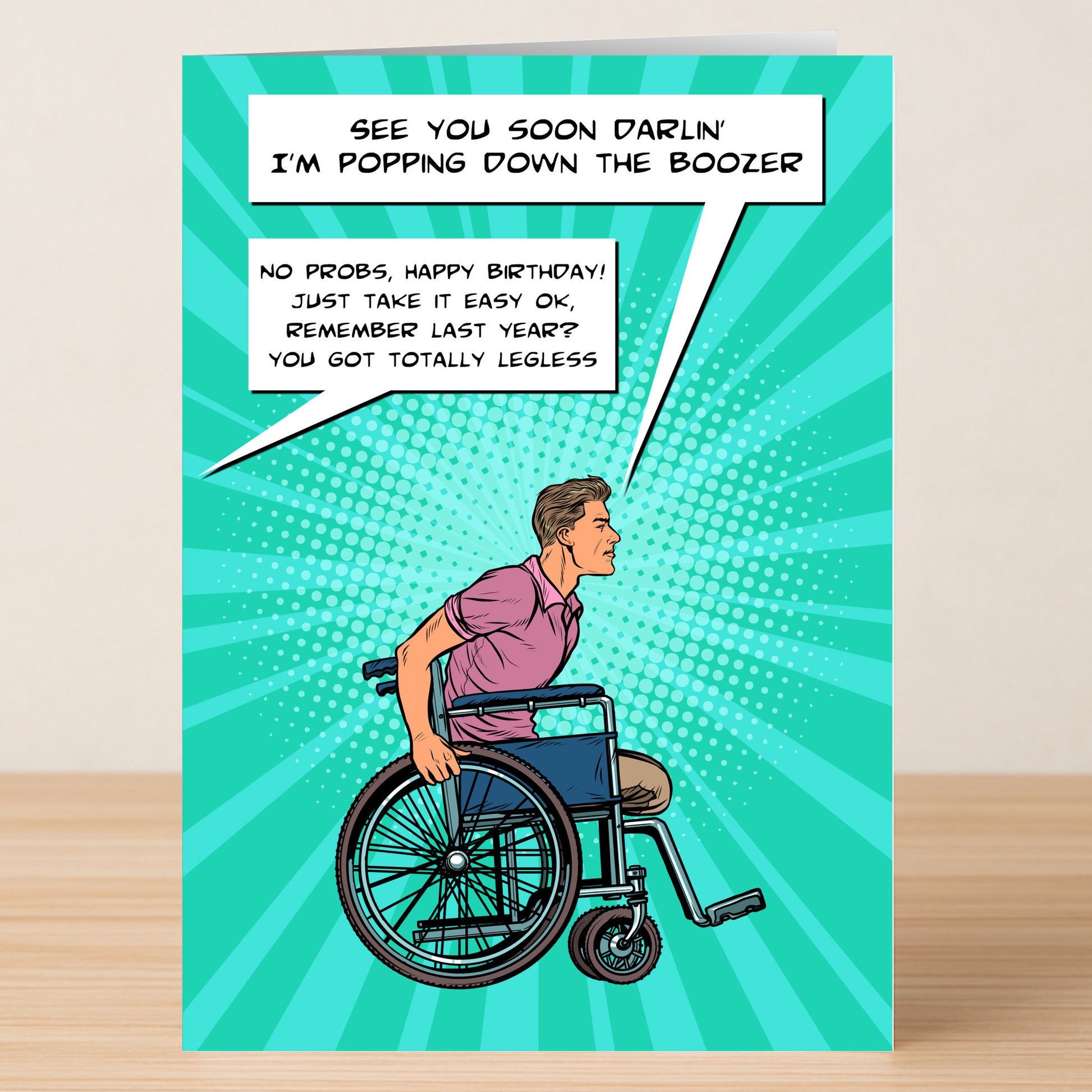 Legless – Funny Birthday Card by Twisted Gifts: A comic-style card featuring a man in a wheelchair with humorous speech bubbles about hitting the pub and celebrating a birthday.