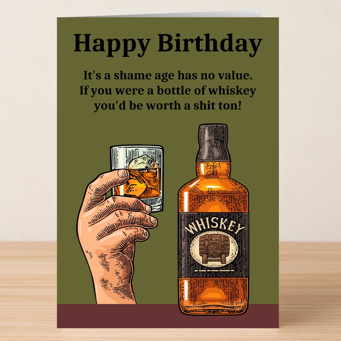 The "Age Has No Value – Insulting Birthday Card" by Twisted Gifts features a whiskey bottle, a hand holding a glass, and witty humour about age versus the value of good whiskey.