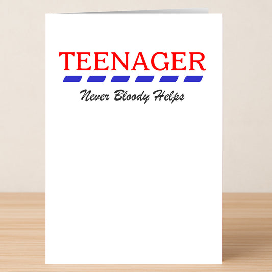 The Twisted Gifts Teenager – Funny Birthday Card sits on a table, displaying "TEENAGER Never Bloody Helps" in red, blue, and black text on a white background.