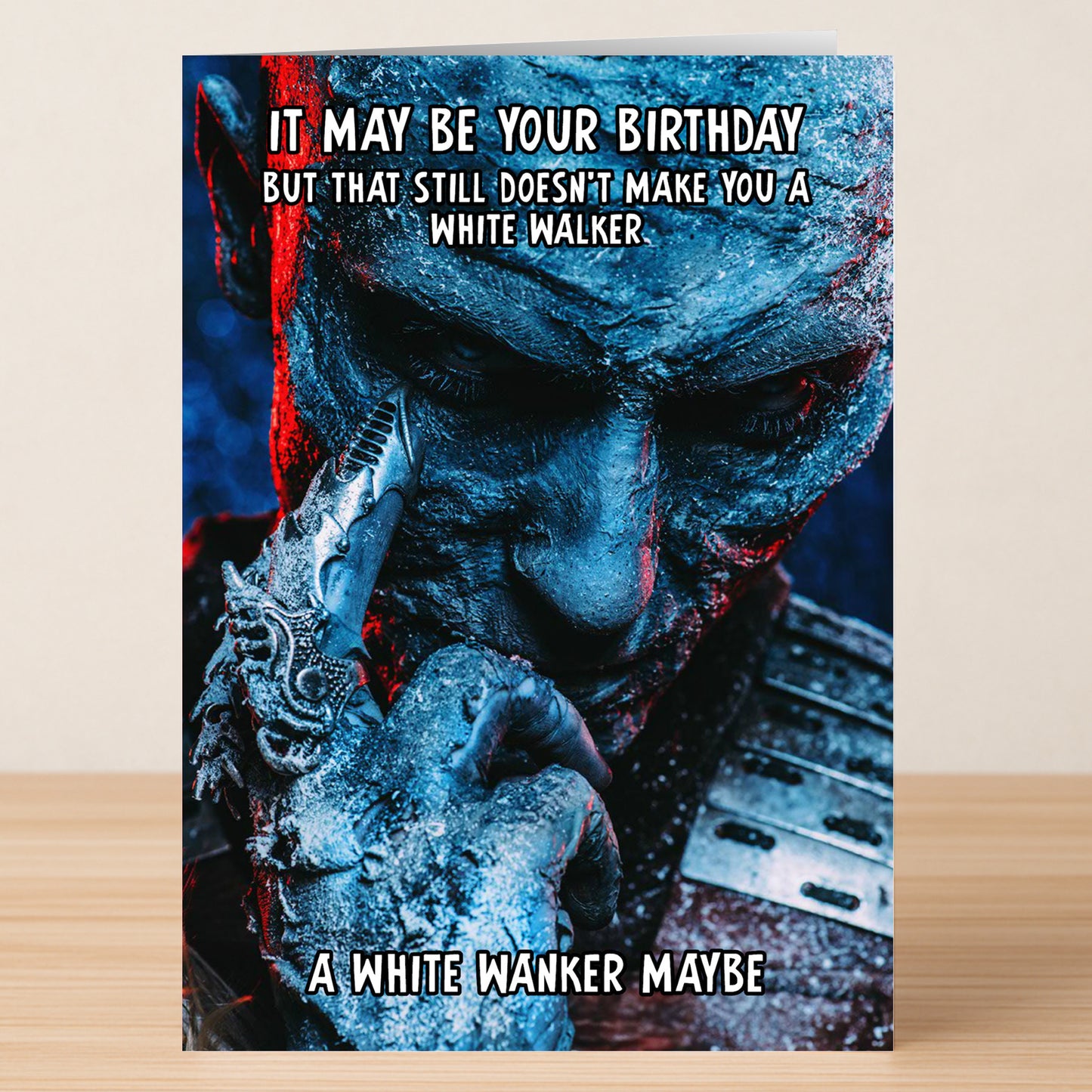 A close-up of a person in icy blue makeup jokes about birthdays and White Walkers—White Walker – Insulting Birthday Card by Twisted Gifts is perfect for Game of Thrones fans who love rude, funny cards.
