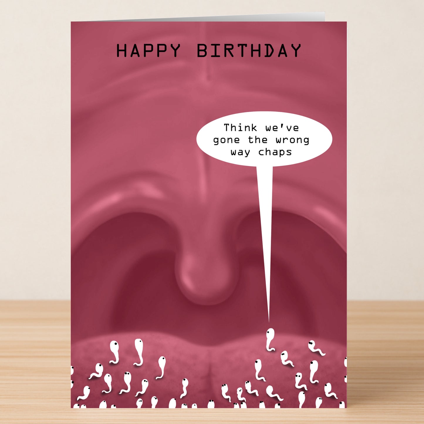 The Wrong Way – Rude Birthday Card by Twisted Gifts features sperm lost in a mouth, with one saying, "Think we've gone the wrong way chaps," under "Happy Birthday"—perfect for cheeky birthday celebrations.