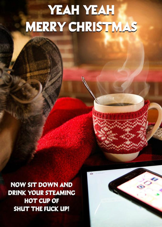 A woman is sitting on a couch with a cup of coffee and a tablet, browsing through the Shut Up Rude Christmas cards from Twisted Gifts.