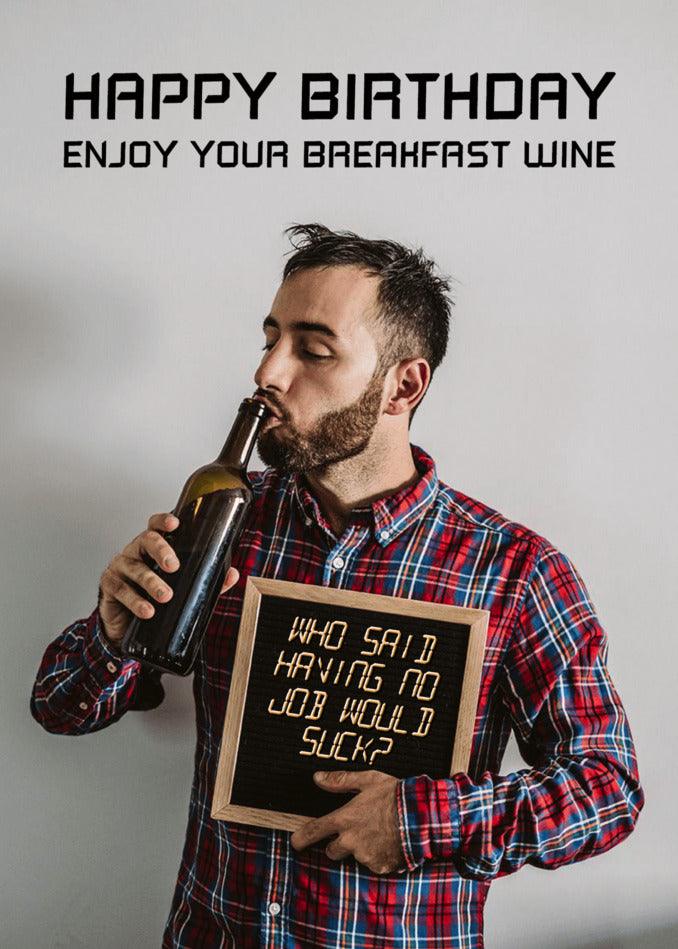 A man holding a sign that says Twisted Gifts Suck Insulting Birthday Card and enjoying his breakfast wine.