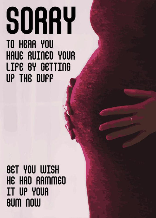 A pregnant woman's belly with the Up The Duff Rude Sorry Card by Twisted Gifts written on it, expressing empathy for your hand hitting up the cup.